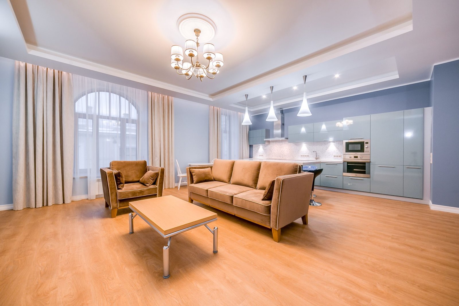 Clean living room with a sofa after an hourly cleaning service in Al Ain
